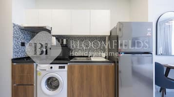 Apartamento, sacada | Cozinha privada