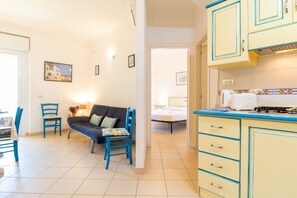 Living area - Blue Wave apartment- Swimming pool (Oristano)