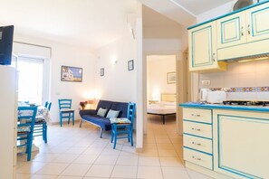 Living area - Blue Wave apartment- Swimming pool (Oristano)