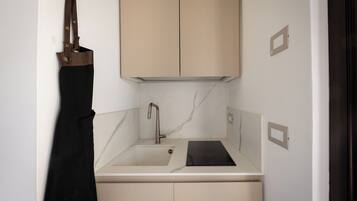 Deluxe Apartment, Patio | Private kitchen