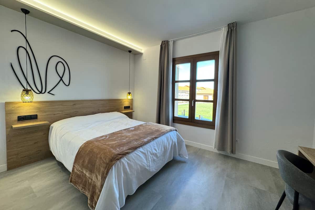 Quarto casal, vista para o jardim