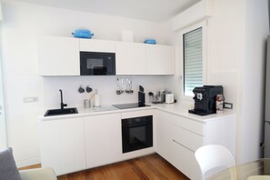 Private kitchen - Lecasinedigio1 Spacious penthouse with large sea view terrace (Alghero)