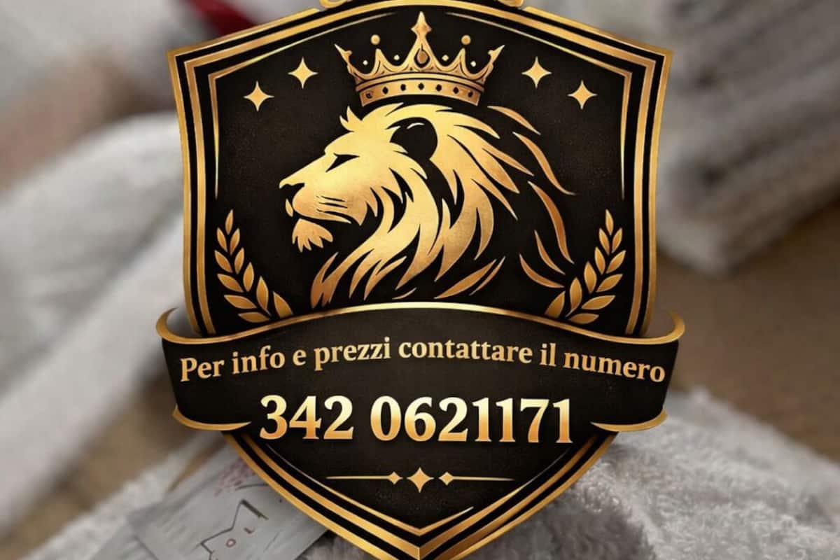 Un logo représentant un lion et une couronne, ainsi qu’un numéro de téléphone.