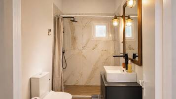 Appartement, uitzicht op zee | Badkamer