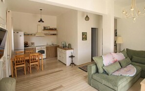 Apartamento, vista para o mar | Área de estar