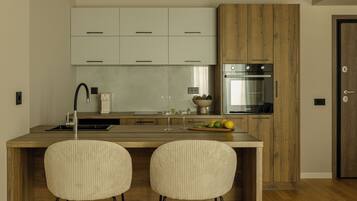 Appartement Deluxe, 1 chambre | Cuisine privée | Réfrigérateur, four, plaque de cuisson