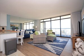 TV, DVD player - Bright, comfortable 2 bedroom oceanfront condo with free WiFi, coastal decor, and an amazing view of the ocean from the balcony located uptown mere steps to the beach! (Ocean City)