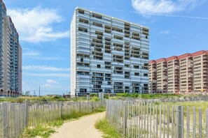 Exterior - Bright, comfortable 2 bedroom oceanfront condo with free WiFi, coastal decor, and an amazing view of the ocean from the balcony located uptown mere steps to the beach! (Ocean City)
