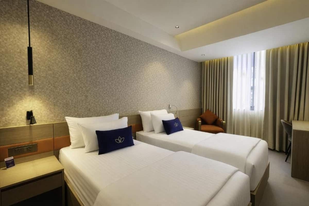 Minibar, laptop workspace, blackout drapes, soundproofing