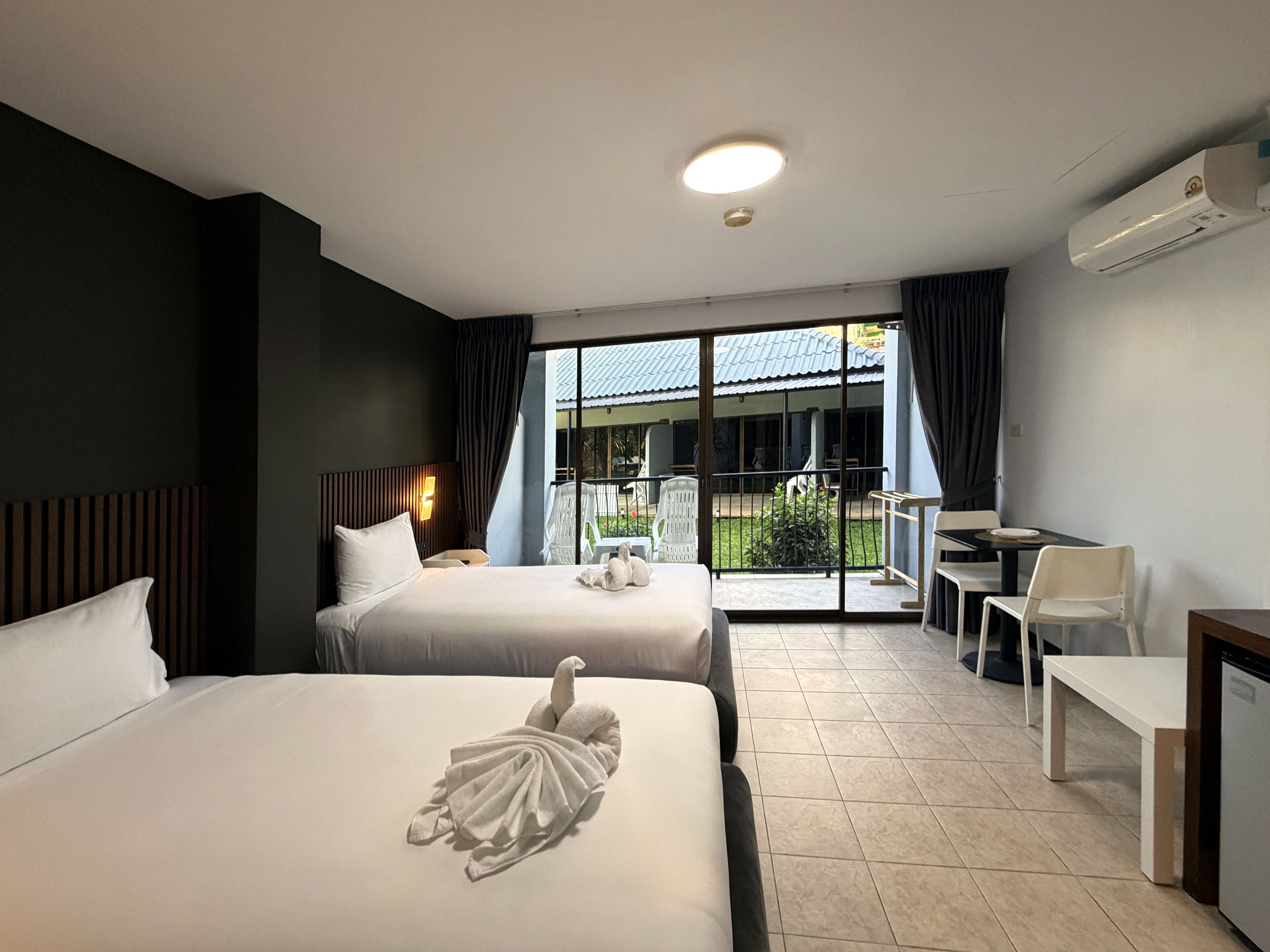 Chambre Deluxe avec lits jumeaux, balcon | Literie de qualité supérieure, couette en duvet d'oie