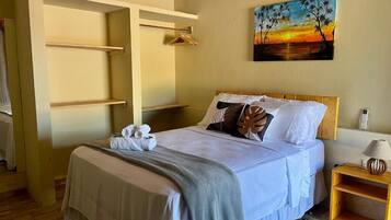 Suíte conforto, vista para o jardim