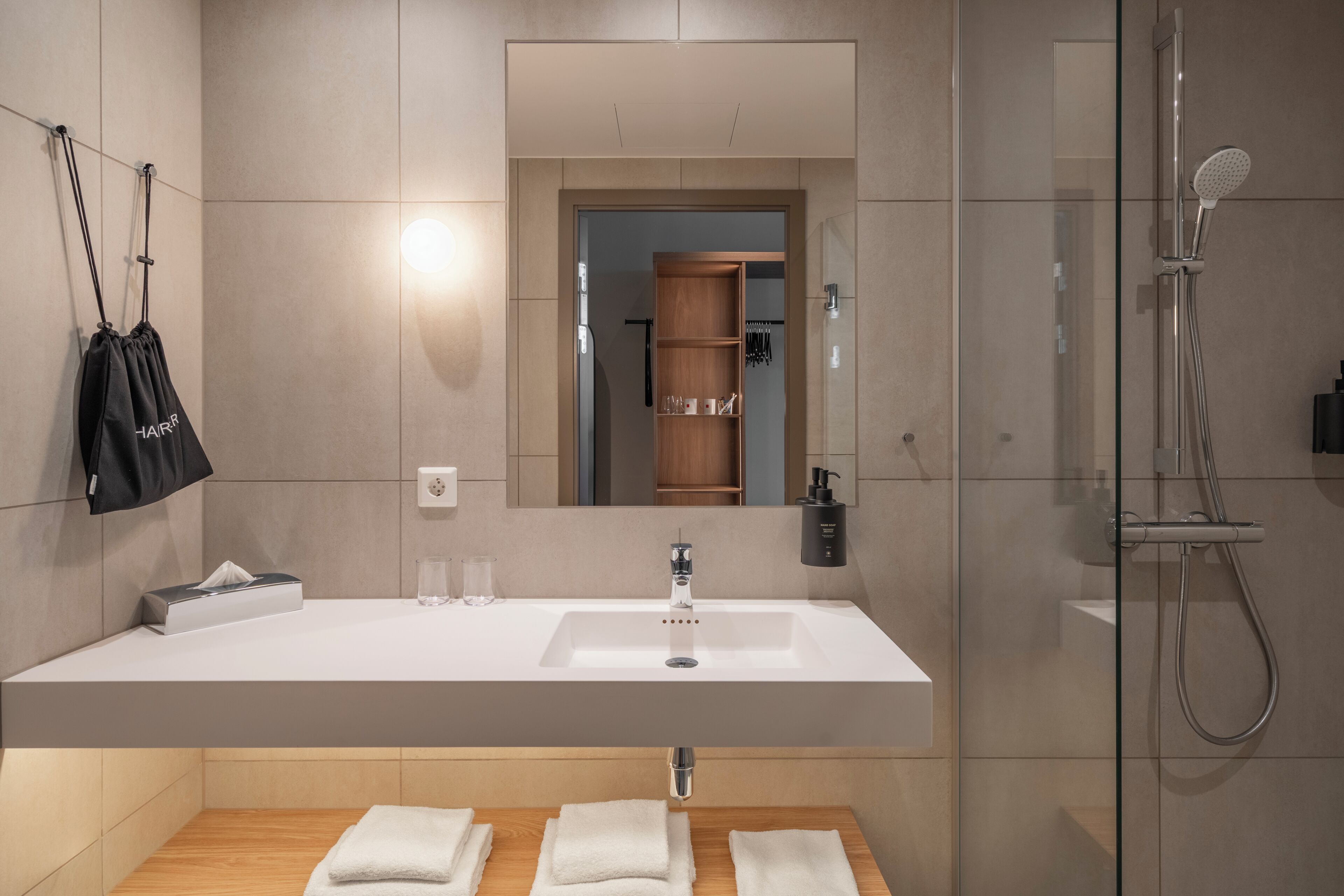Shower, free toiletries, hair dryer (on request), towels