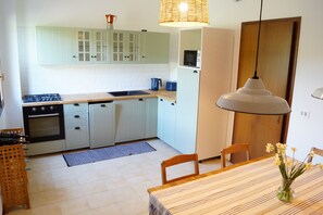 Casa, vista al río | Cocina privada