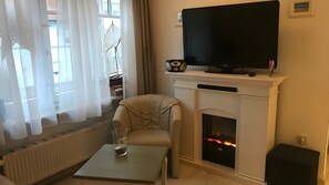 TV, fireplace - Apartment No. 4 for 4 People (38 m²) in Dahme (Dahme)