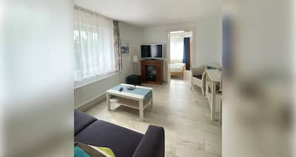 Practical 2-Room Family Apartment with Terrace and Garden Access