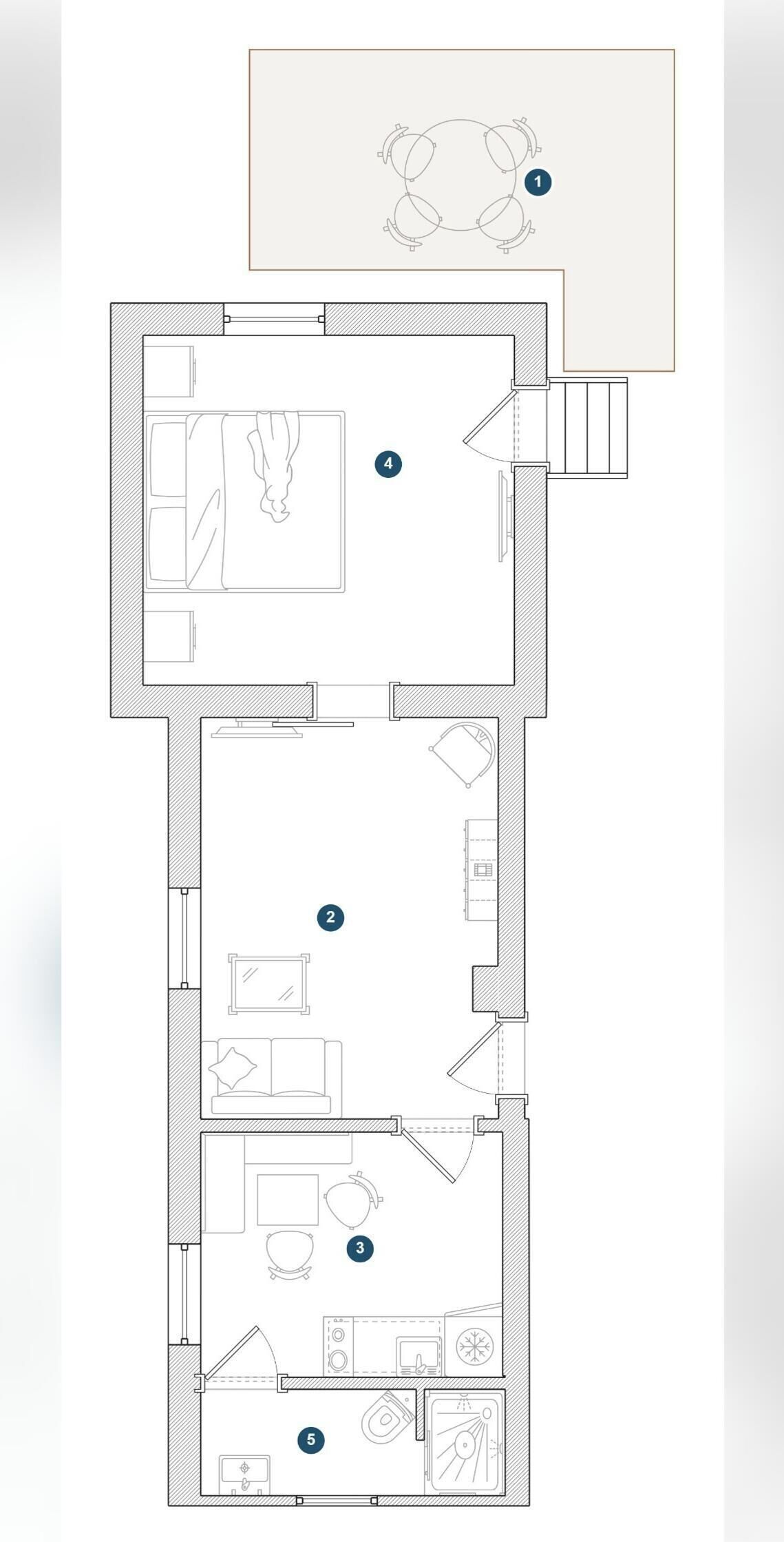 A floor plan of a hotel with a bedroom, bathroom, kitchen, and living area.