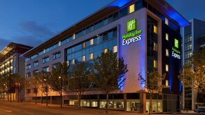 A Holiday Inn Express hotel with a modern design, large windows, and a prominent sign. - Holiday Inn Express Newcastle City Centre (Newcastle-upon-Tyne)