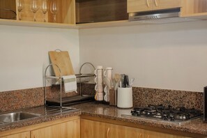Apartment, 4 Bedrooms, Balcony, Golf View | Private kitchen - Camp John Hay Cabin (Baguio)