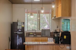 Apartment, 3 Bedrooms, Balcony, Golf View | Private kitchen | Full-size fridge, microwave, oven, stovetop - Camp John Hay Cabin (Baguio)