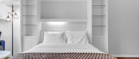 Comfort Studio Suite | Living area | 50-inch flat-screen TV with digital channels