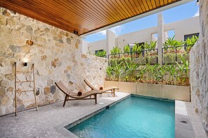 Outdoor pool, sun loungers