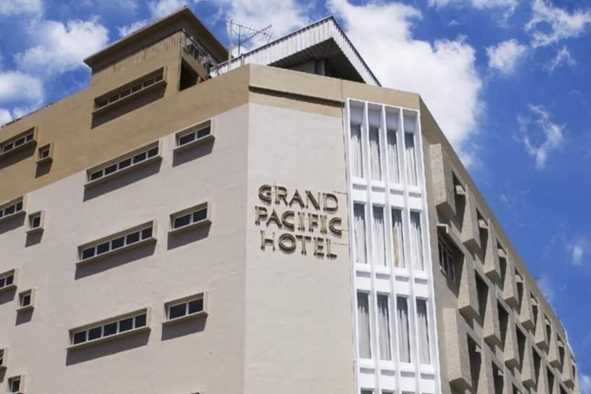 A building with the sign 'Grand Pacific Hotel' indicating a hotel property.
