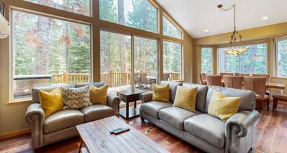 Upscale house with 2 living areas, open layout, hot tub, backyard, & luxe suite