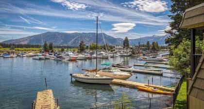 Two-story lakefront condo with access to dock, hot tub, pool & tennis