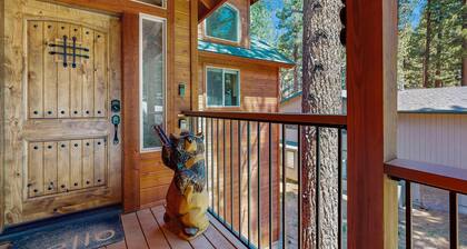 Dog-friendly wooded retreat near skiing, beaches, dining with 2 living rooms & deck