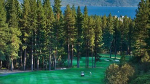 A golf course with a view of a lake and mountains. - Charming townhome w/ modern touches, great outdoor space, free WiFi (Incline Village)