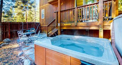 Cozy, enchanting retreat with hot tub, stunning deck, & balcony - close to beach