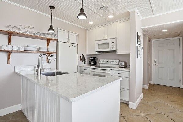 Fridge, microwave, oven, stovetop - Oceanfront Shipwatch #300 • Pool + Boardwalk on East Beach (St Simons)
