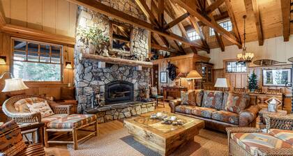 Beautiful lakefront home with dock, stone fireplace, W&D, and nearby activities