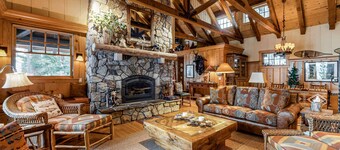 Beautiful lakefront home with dock, stone fireplace, W&D, and nearby activities