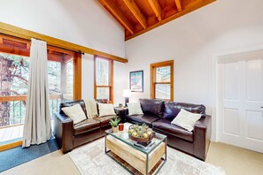 Living area - Peaceful mountain retreat with pool, hot tub, & deck views - near skiing & golf (Truckee)