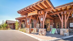 A wooden building with a sign reading 'Alder Creek Adventure Center.' - Cozy studio condo with kitchenette, deck, WiFi, & nearby activities (Truckee)