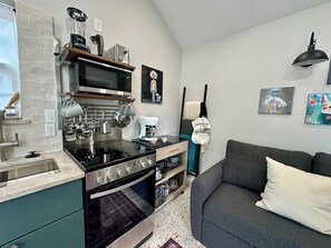 Fridge, microwave, oven, stovetop - Boutique Tiny Home Retreat Near Love Field | Monthly (Dallas)