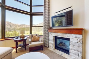TV, fireplace, offices - Everline Resort & Spa Ski-in-ski-out condo with elevator, pool, hot tub, & spa (Olympic Valley)