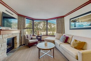 TV, fireplace, offices - Luxe Ski-in-ski-out King Suite with Fireplace, Resort Pools, Spa & Gym (Olympic Valley)