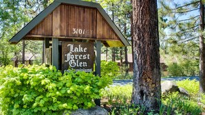 A wooden structure labeled 'Lake Forest Glen' with a number '3101' on it. - Homey Family Condo with Shared Pool, Hot Tub, Tennis & Lovely Lake Views (Tahoe City)