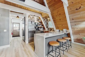 Fridge, microwave, oven, stovetop - Beautiful A-frame home with deck, streaming, and dog friendly - near skiing (South Lake Tahoe)