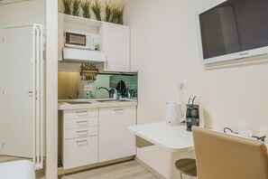 Monolocale comfort, vista cortile | Cucina privata