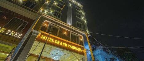 A hotel with a prominent sign reading 'HOTEL GRAND CABBANA' and a visible entrance.