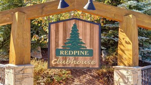 A wooden pergola with a sign that reads 'Redpine Clubhouse.' - Two Lofts, Mountain Views, Gas Fireplace, Shared Seasonal Hot Tub & Pools (Park City)