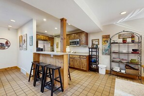 Fridge, microwave, oven, stovetop - Spacious split-level townhome with private hot tub & game room -close to canyons (Sandy)