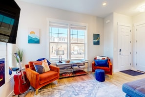 TV, fireplace, offices - Stunning dog-friendly retreat with large balcony, fireplace, & mountain views (Hideout)