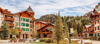 Ski-in - ski-out Powderhorn Condo with Shared Hot Tubs, a Pool & Gym at Club Solitude