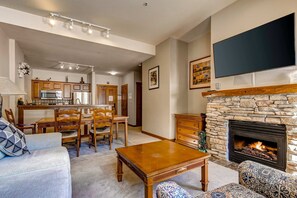 TV, fireplace, table football, offices - Ski-in - ski-out Powderhorn Condo with Shared Hot Tubs, a Pool & Gym at Club Solitude (Solitude)