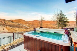 Outdoor spa tub - Home with fireplace, private hot tub, shared pool, game and fitness facilities (Kamas)