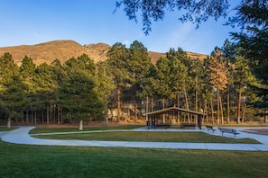 A park with a pavilion, benches, and a pathway. - Updated Condo with Private Hot Tub, Mountain Views, & Gas Grill - Close to Skiing (Cottonwood Heights)